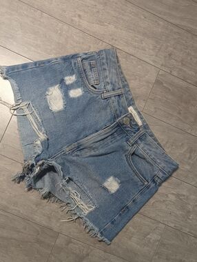 Distressed Light Blue Denim Jean Shorts with Frayed Hem